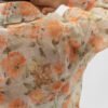 Blusa con estampado floral en tonos Coral