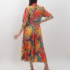 Conjunto de Camisa de Botones y Falda Midi Plisada con Estampado Tropical