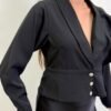 Chaqueta Negra con Volantes
